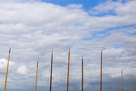 Masts of skûtsjesilen boats in Frisia, The Netherlandsの写真素材
