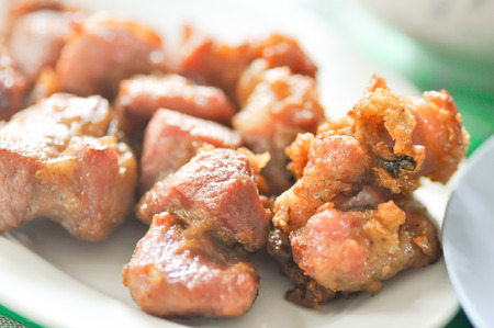 fried pork dish on the tableの写真素材