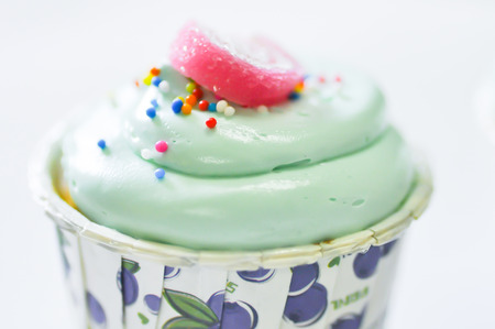 green cupcake with jelly and icingの写真素材