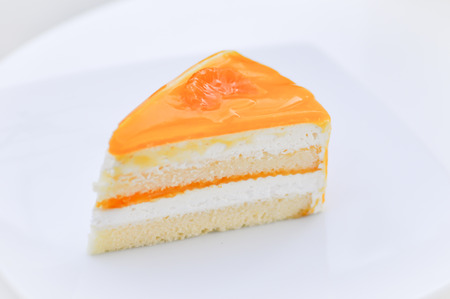 a piece of orange cake dishの写真素材