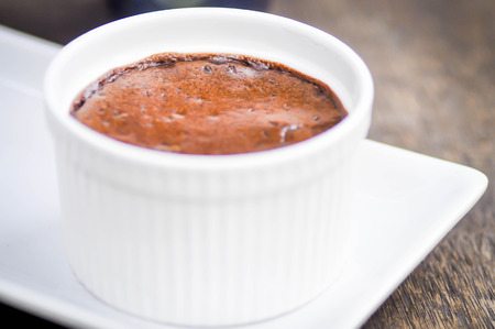 Chocolate lava cake in a baking cupの写真素材