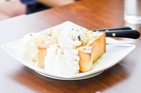 honey toast and ice cream dishの写真素材