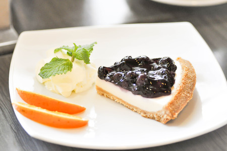 blueberry cheese pie with wip creamの写真素材