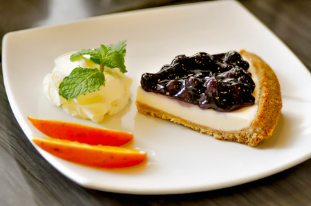 blueberry cheese pie with wip creamの写真素材