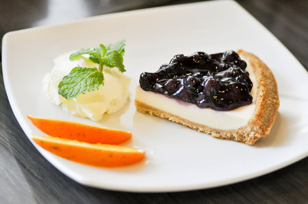 blueberry cheese pie with wip creamの写真素材