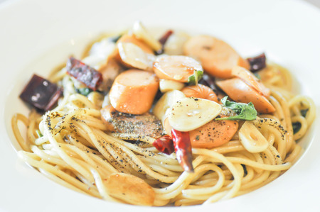 spicy spaghetti, spaghetti with bacon and chili dishの写真素材