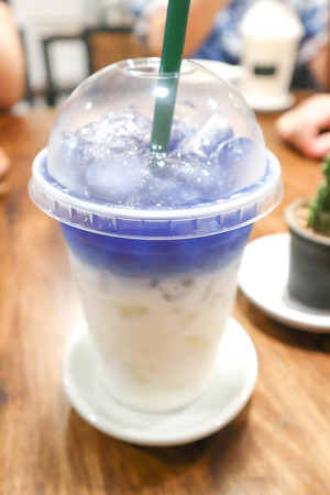 butterfly pea milk or milk with butterfly pea juice  toppingの写真素材
