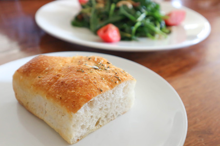 some bread in a white dishの写真素材