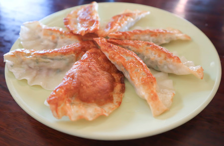 fried wonton dish on the tableの写真素材