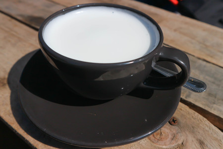 hot milk or a cup of milkの写真素材