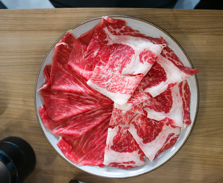 raw beef or sliced beef dish