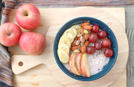 yogurt with grape ,almond and banana toppingの写真素材