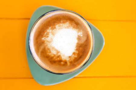 cappuccino or latte or hot coffee on the tableの写真素材