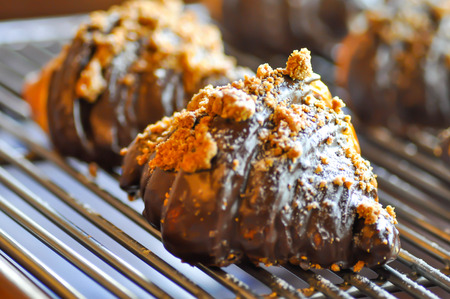 croissant pastry or chocolate croissant with cane sugar topping