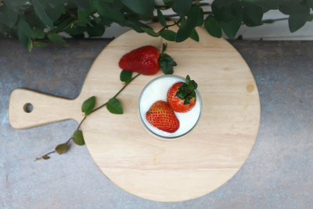 yogurt or natural yogurt with strawberry toppingの写真素材