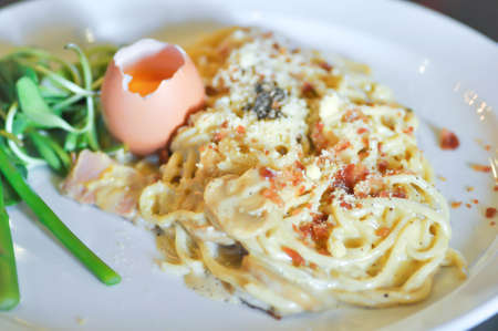 spaghetti or spaghetti carbonara with eggの写真素材