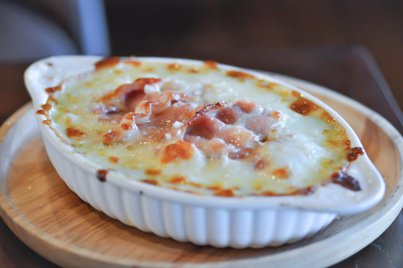 baked spinach with cheese and baconの写真素材