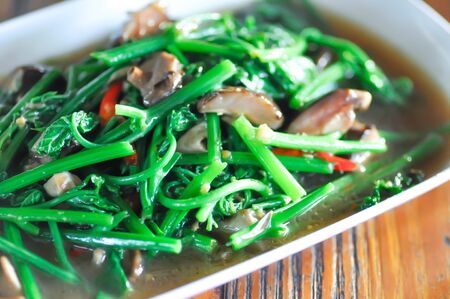 stir-fried vegetables or stir-fried chayote with mushroom