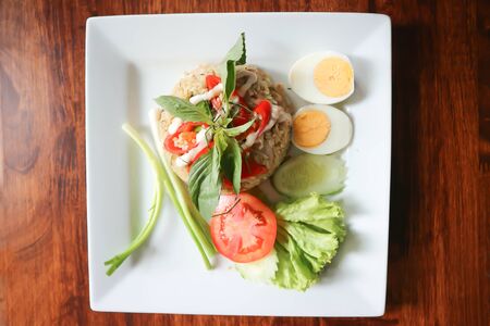 stir-fried rice with green curry and boiled egg ,thai stir-fried riceの写真素材