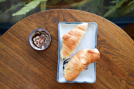 croissant and almond croissant with dip
