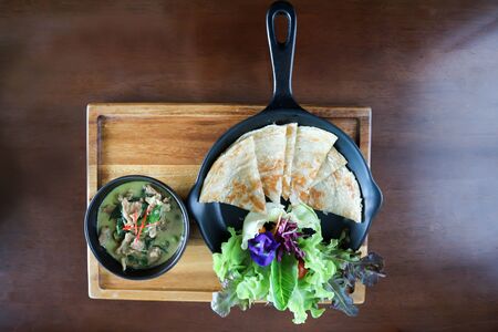 naan bread or roti with curry soup, Thai food
