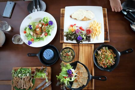 fish steak, salmon salad and roti in Top viewの写真素材