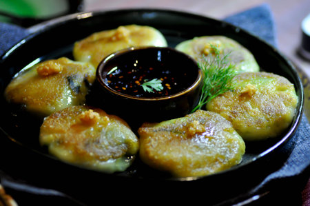 bun , Thai bun or vegetable stuffed bun with sauceの写真素材