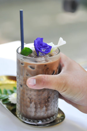 holding chocolate or iced chocolate, mocha