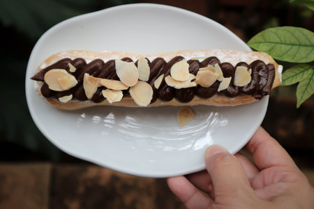 choux pastry with chocolate topping or eclair ,choux stick