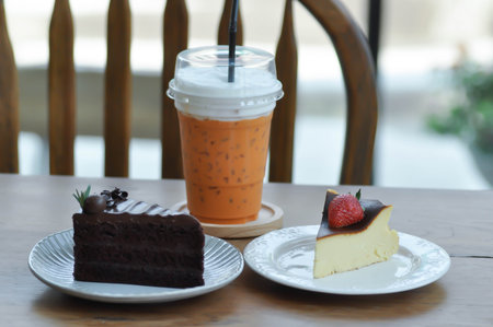 basque burnt cheesecake, burnt cheesecake with strawberry topping and chocolate cake and milk tea