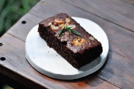 brownie, chocolate cake with cashew nut and almond topping