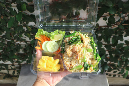 stir fried rice with vegetable and pineapple in the box