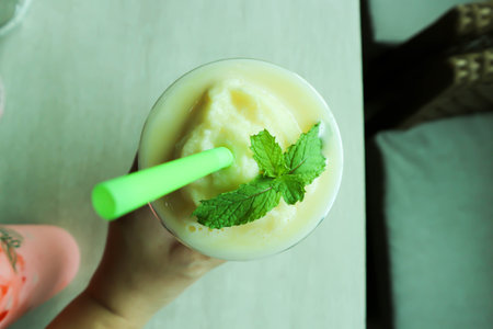 mango smoothie or mango yogurt smoothie for serveの写真素材