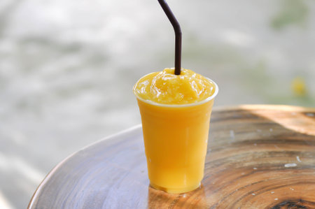 mango smoothie or mango yogurt smoothie for serveの写真素材