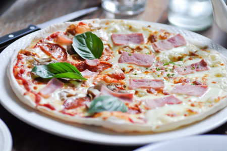 pizza or pepperoni pizza and ham and cheese pizza or half pizzaの写真素材