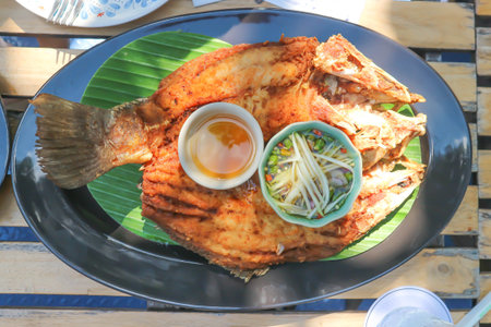 deep fried fish, deep fried bass or deep fried striped bass with dip