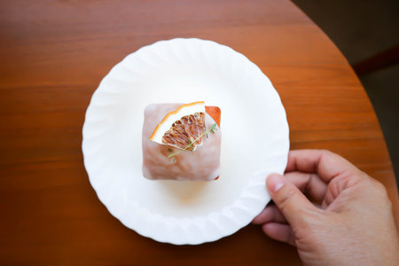 lemon cake or lemon drizzle cake , orange cake or carrot cake with sugar topping for serveの写真素材