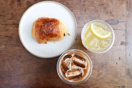 croissant , French croissant or French bread or bread and iced coffee