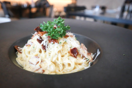 Pasta carbonara or Spaghetti with ham and mushroom , 
Spaghetti carbonara for serveの写真素材