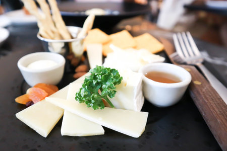 Cold cuts with salami ,crackers dried fruit and different types of cheeseの写真素材