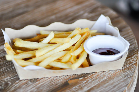 French fries or fried potato , fries or chips and ketchuo or potato sauceの写真素材