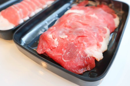 raw beef or sliced beef and raw pork or meat for cookの写真素材