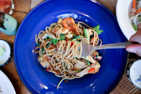 spicy pasta or seafood pasta or spicy spaghetti or seafood spaghetti ,Thai spaghetti for serveの写真素材