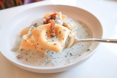 pasta or tortellini with guanciale , pasta carbonara for serve