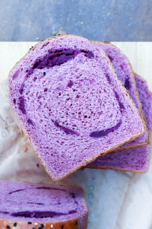 loaf of bread ,sweet potato bread with sesame toppingの写真素材