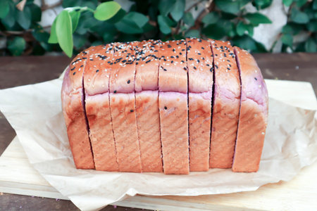 loaf of bread ,sweet potato bread with sesame topping