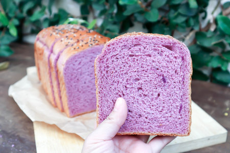loaf of bread ,sweet potato bread with sesame toppingの写真素材