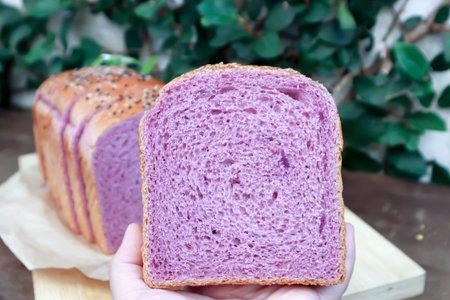 loaf of bread ,sweet potato bread with sesame toppingの写真素材