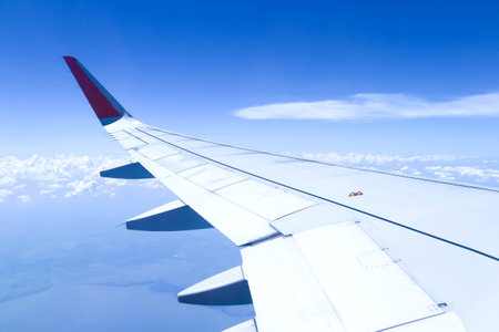 sky and wing of the plane ,plane wingの写真素材