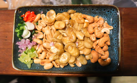 Broad bean , cashew nut and peanuts or fava beans with vegetable